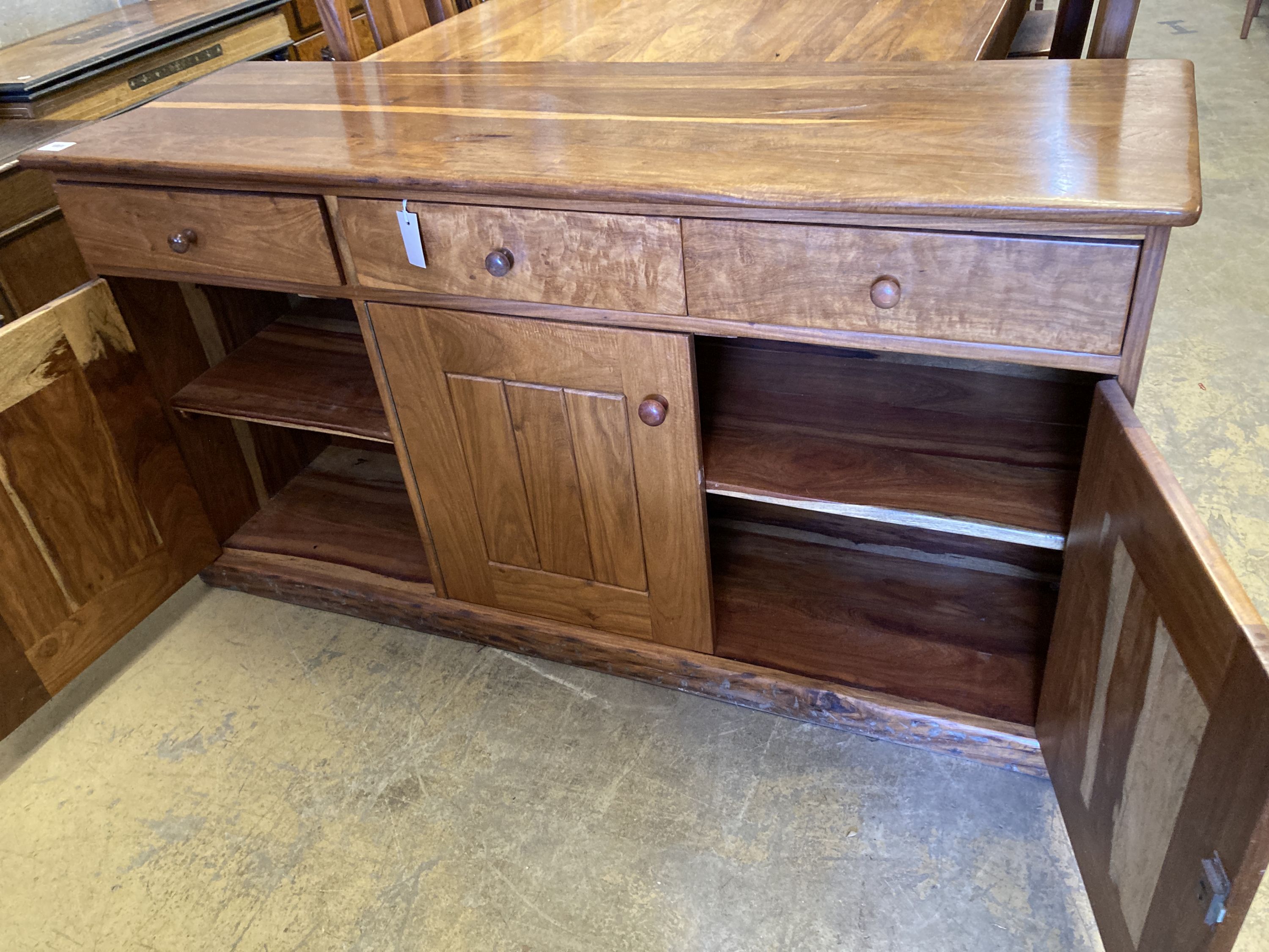 A hardwood suite, table length 200cm, depth 118cm, height 78cm